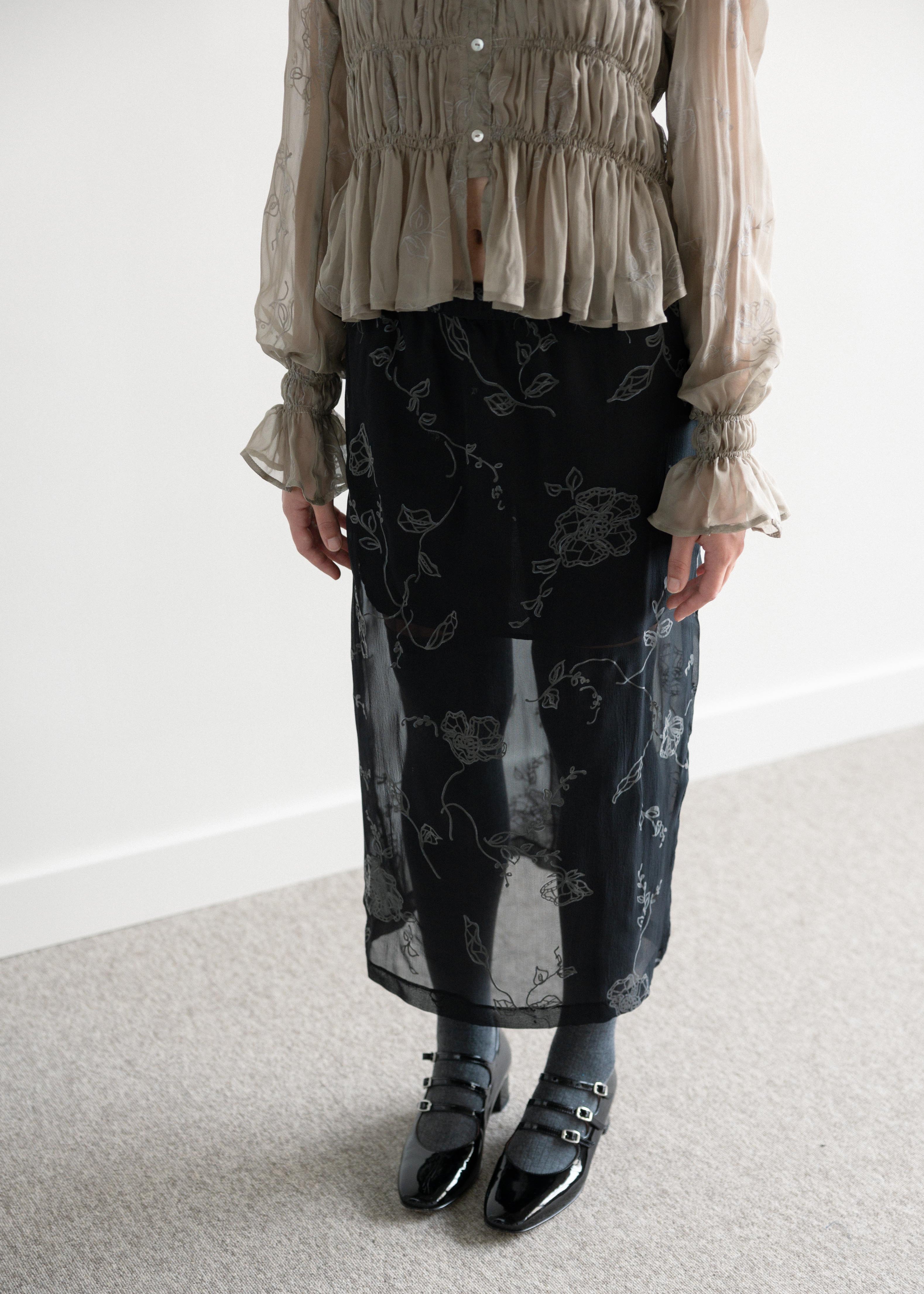 Saia Midi Elástico Transparente Floral